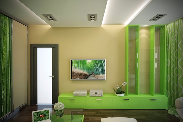 ห้องนั่งเล่นคอนโดสีเขียว ใช้เป็นห้องทำงานในตัว